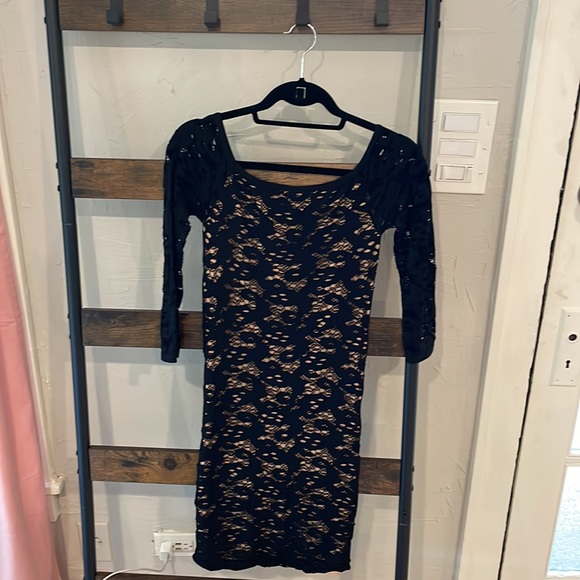 Black stretchy dress with nude layer of material. - Picture 3 of 3